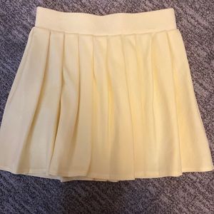 Pleated yellow skirt